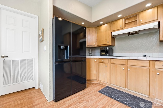 119 Oyler Way, Ethel, WA 98542 - kitchen with black appliances, tile countertops, under cabinet range hood, light wood-style flooring, and recessed lighting