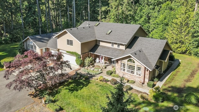 5990 6th Ave SE, Lacey, WA 98503 - aerial view of property and surrounding area featuring a heavily wooded area