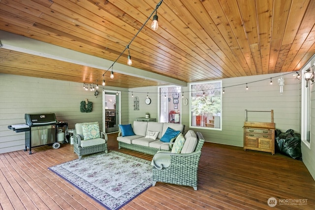 5990 6th Ave SE, Lacey, WA 98503 - living room featuring track lighting, wood walls, hardwood / wood-style floors, and wooden ceiling