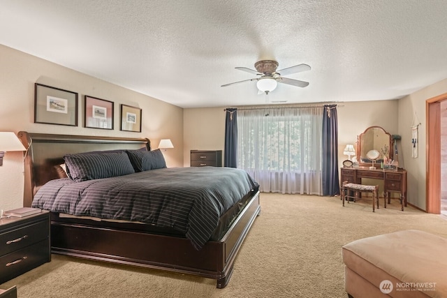 5990 6th Ave SE, Lacey, WA 98503 - bedroom with a textured ceiling, light colored carpet, and ceiling fan