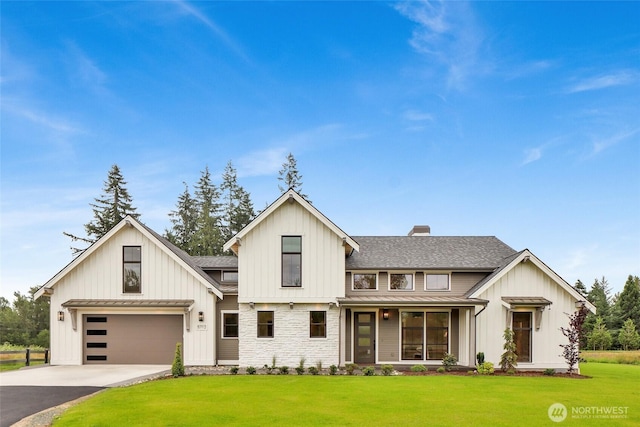 5712 Denali Ln, Bellingham, WA 98226 - modern farmhouse with a standing seam roof, board and batten siding, driveway, and a front lawn