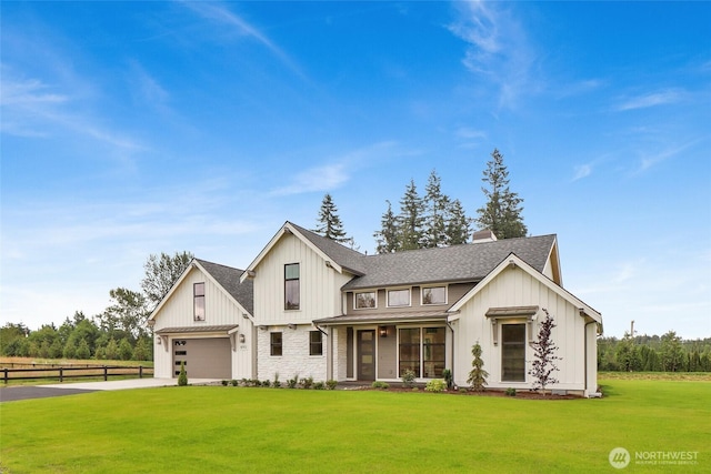 5712 Denali Ln, Bellingham, WA 98226 - modern inspired farmhouse featuring driveway, roof with shingles, board and batten siding, and a standing seam roof