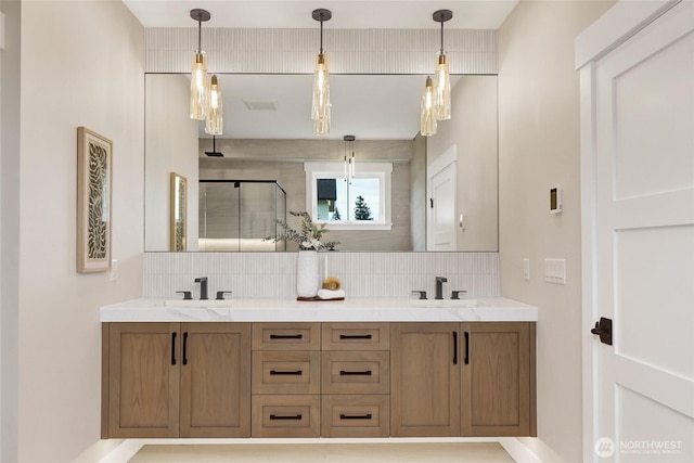 5712 Denali Ln, Bellingham, WA 98226 - bathroom with backsplash, a shower stall, and double vanity