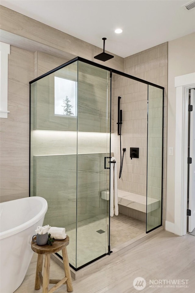 5712 Denali Ln, Bellingham, WA 98226 - bathroom featuring a stall shower, a soaking tub, and recessed lighting