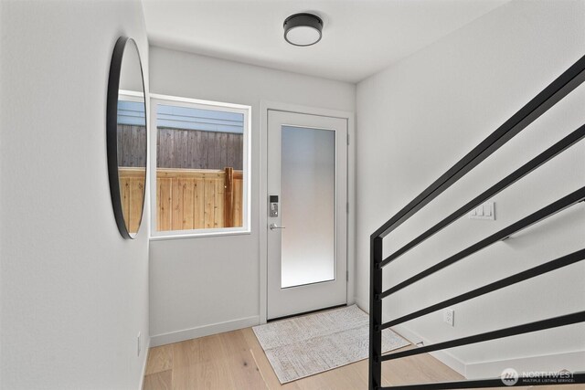 4519A Bagley Ave N, Seattle, WA 98103 - foyer with wood finished floors and baseboards