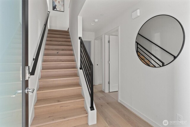 4519A Bagley Ave N, Seattle, WA 98103 - staircase featuring wood finished floors and baseboards