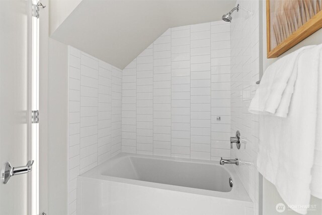 4519A Bagley Ave N, Seattle, WA 98103 - bathroom featuring lofted ceiling and shower / washtub combination