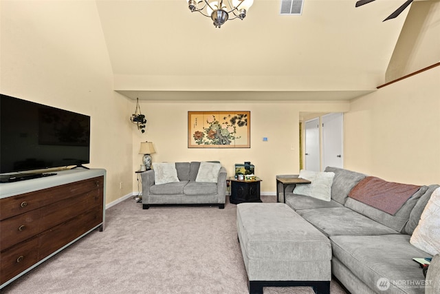1291 Channel Ave SW, Ocean Shores, WA 98569 - living room featuring high vaulted ceiling, light colored carpet, baseboards, and a ceiling fan
