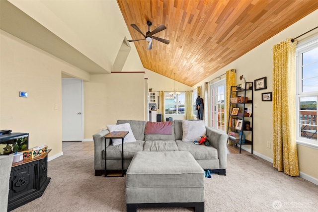 1291 Channel Ave SW, Ocean Shores, WA 98569 - living area with a ceiling fan, carpet flooring, wood ceiling, baseboards, and vaulted ceiling