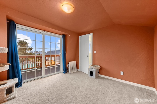 1291 Channel Ave SW, Ocean Shores, WA 98569 - carpeted spare room with lofted ceiling, radiator heating unit, and baseboards