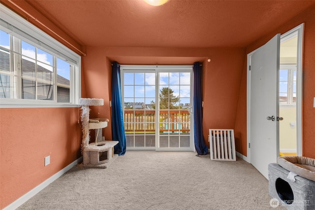 1291 Channel Ave SW, Ocean Shores, WA 98569 - unfurnished sunroom featuring radiator