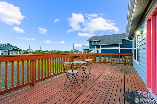 1291 Channel Ave SW, Ocean Shores, WA 98569 - wooden terrace featuring a residential view