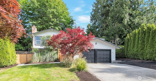 2015 172nd Pl SE, Bothell, WA 98012 - view of front facade featuring driveway, a chimney, and an attached garage