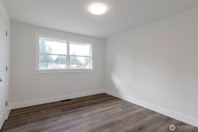 2015 172nd Pl SE, Bothell, WA 98012 - unfurnished room featuring dark wood-type flooring and baseboards
