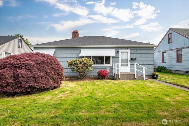 2938 Field St, Longview, WA 98632 - view of front facade featuring a front yard, a chimney, and a shingled roof