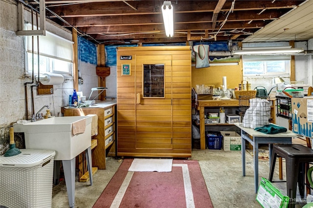 1324 E 2nd St, Port Angeles, WA 98362 - basement featuring plenty of natural light, a workshop area, and a sink