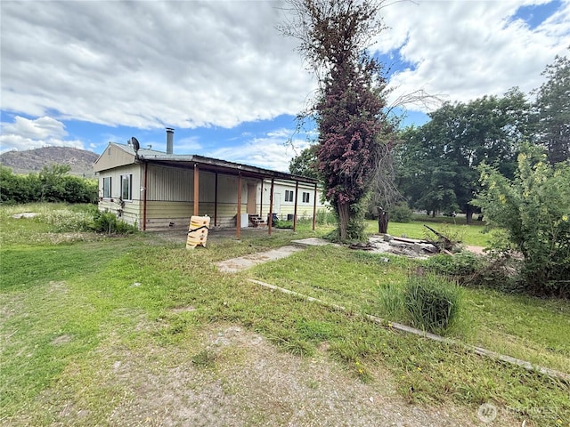 1485B Old Hwy 97, Malott, WA 98840 - rear view of house featuring a yard