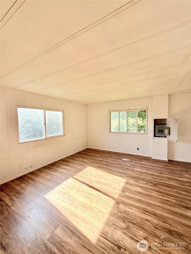1485B Old Hwy 97, Malott, WA 98840 - spare room featuring wood finished floors and wooden walls