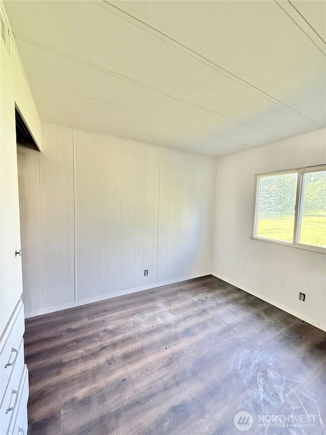 1485B Old Hwy 97, Malott, WA 98840 - spare room featuring dark wood-style floors and baseboards