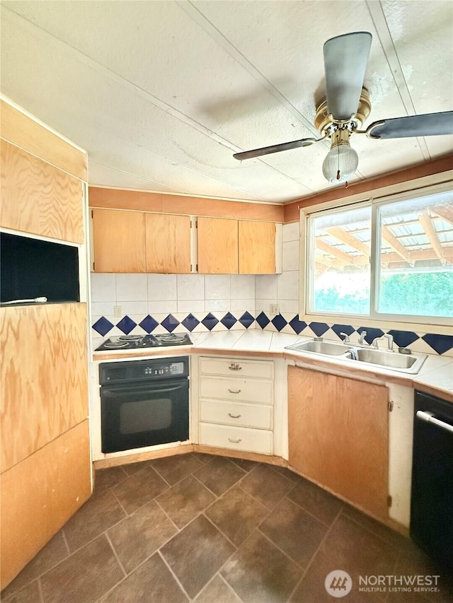 1485B Old Hwy 97, Malott, WA 98840 - kitchen with black appliances, backsplash, a sink, a ceiling fan, and light brown cabinets