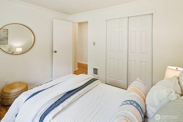 1256 NE 188th St, Shoreline, WA 98155 - bedroom with a closet, ornamental molding, and wood finished floors