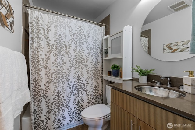500 5th Ave W Unit 501, Seattle, WA 98119 - full bath with vanity, toilet, and a shower with curtain