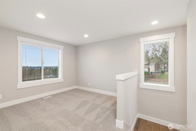 7547 S 130th Pl, Seattle, WA 98178 - carpeted empty room with healthy amount of natural light, baseboards, and recessed lighting