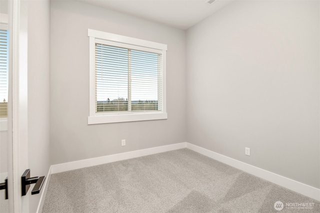 7547 S 130th Pl, Seattle, WA 98178 - carpeted spare room featuring baseboards
