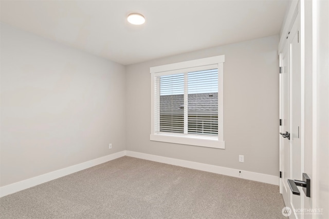 7547 S 130th Pl, Seattle, WA 98178 - unfurnished room featuring baseboards and carpet