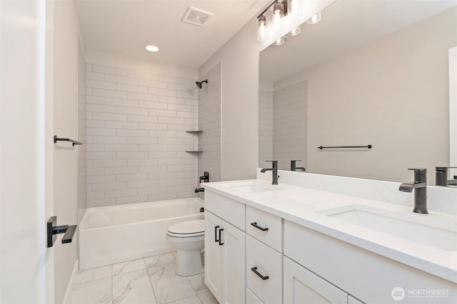 7547 S 130th Pl, Seattle, WA 98178 - full bathroom with double vanity, marble finish flooring, toilet, bathtub / shower combination, and recessed lighting