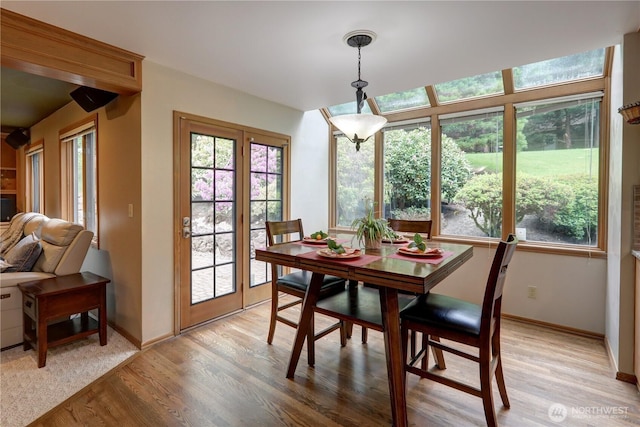 5920 228th Ave NE, Redmond, WA 98053 - dining area featuring healthy amount of natural light, light wood-type flooring, and baseboards