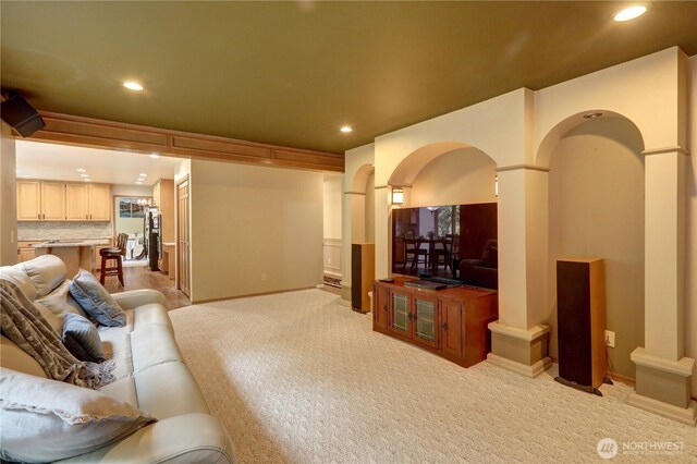 5920 228th Ave NE, Redmond, WA 98053 - living room with recessed lighting, light carpet, ornate columns, and baseboards