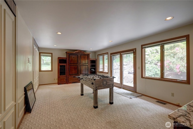 5920 228th Ave NE, Redmond, WA 98053 - recreation room featuring light carpet, baseboards, and recessed lighting