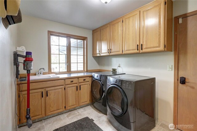 5920 228th Ave NE, Redmond, WA 98053 - laundry room featuring cabinet space and separate washer and dryer