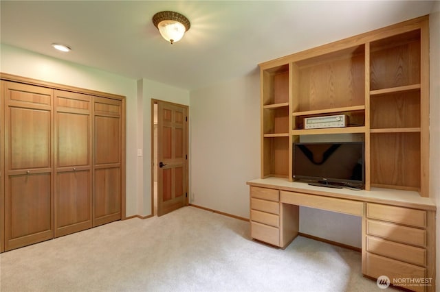 5920 228th Ave NE, Redmond, WA 98053 - unfurnished office with light colored carpet, built in study area, and baseboards