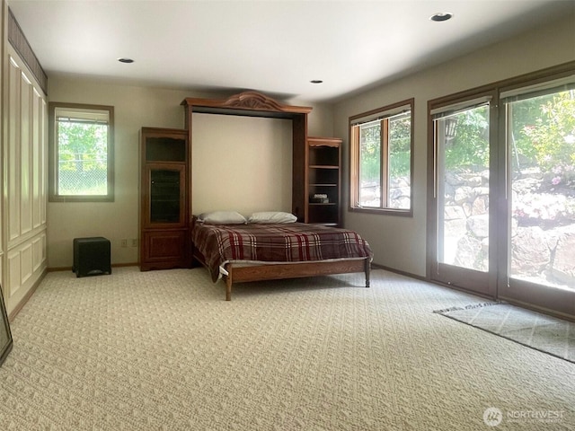 5920 228th Ave NE, Redmond, WA 98053 - bedroom featuring light carpet, access to outside, and baseboards