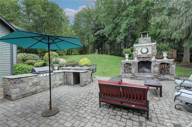 5920 228th Ave NE, Redmond, WA 98053 - view of patio featuring an outdoor living space with a fireplace and view of wooded area