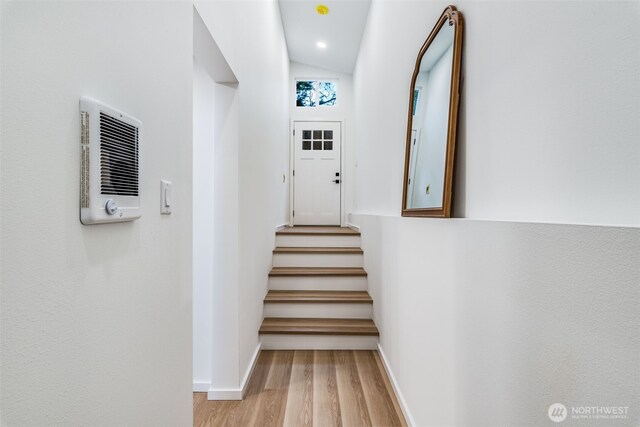 3718 W Arsenal Way, Bremerton, WA 98312 - stairway with baseboards, wood finished floors, and vaulted ceiling