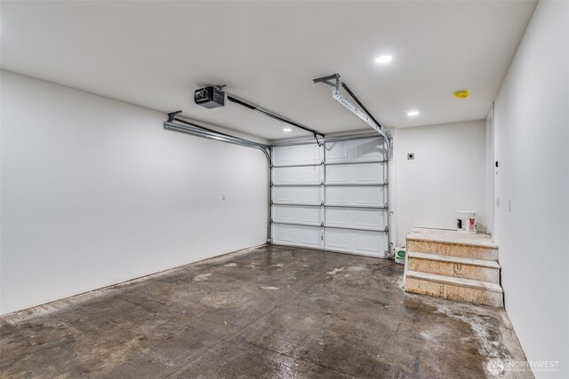 3718 W Arsenal Way, Bremerton, WA 98312 - garage featuring a garage door opener and recessed lighting