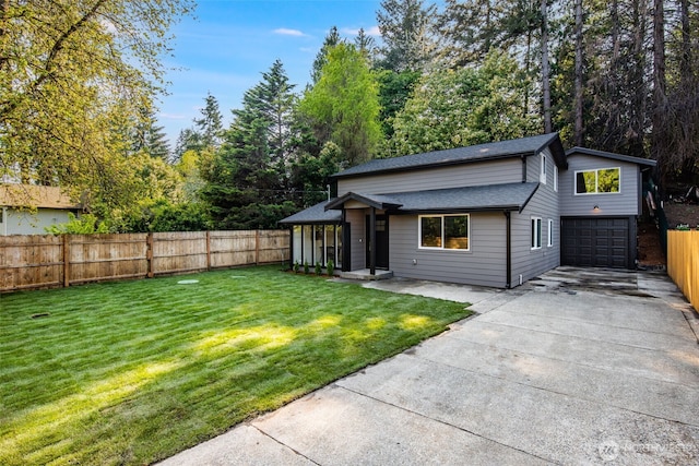 3718 W Arsenal Way, Bremerton, WA 98312 - view of front of house with a garage, concrete driveway, and a shingled roof