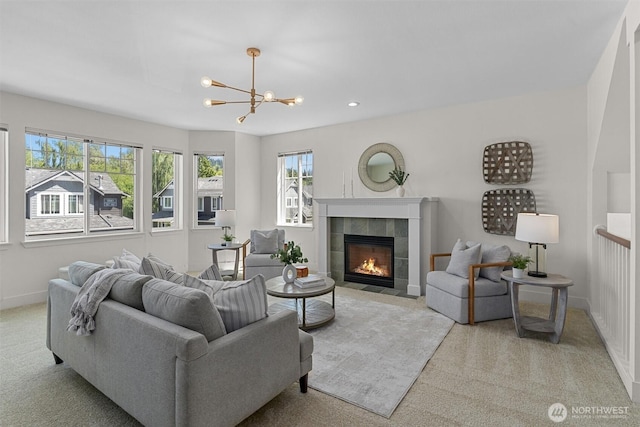 5529 Lakemont Blvd SE Unit 901, Bellevue, WA 98006 - living area featuring carpet, a chandelier, a fireplace, baseboards, and recessed lighting