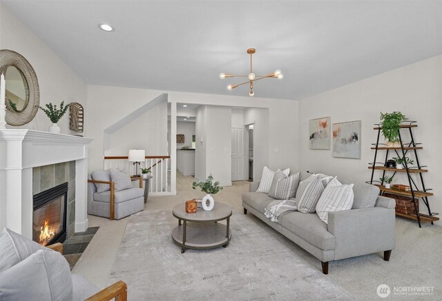 5529 Lakemont Blvd SE Unit 901, Bellevue, WA 98006 - living area with carpet flooring, a chandelier, a tile fireplace, and recessed lighting