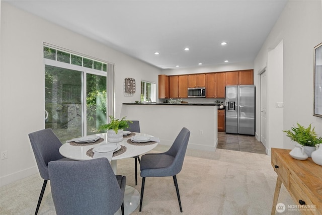 5529 Lakemont Blvd SE Unit 901, Bellevue, WA 98006 - dining room featuring recessed lighting, light carpet, and baseboards