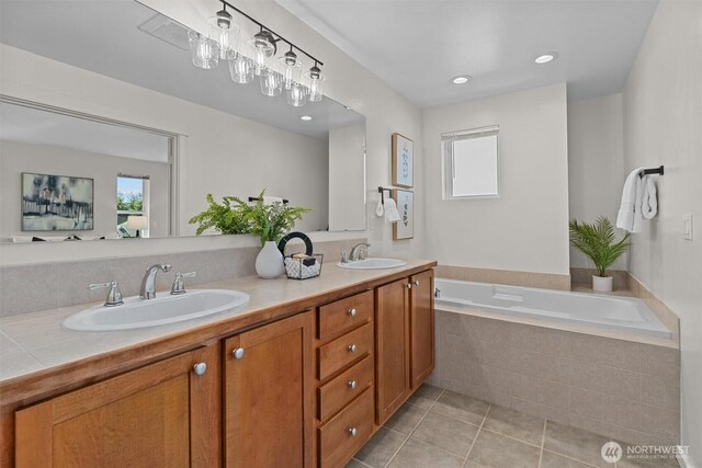 5529 Lakemont Blvd SE Unit 901, Bellevue, WA 98006 - bathroom featuring double vanity, tile patterned flooring, a garden tub, and recessed lighting