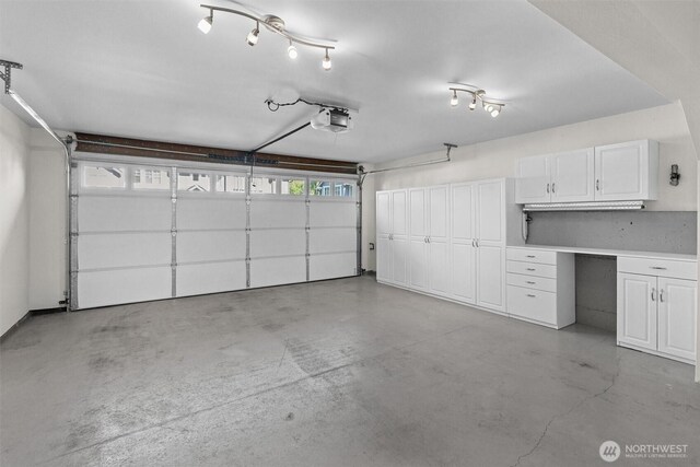 5529 Lakemont Blvd SE Unit 901, Bellevue, WA 98006 - garage with a garage door opener