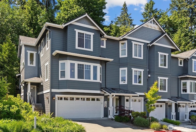 5529 Lakemont Blvd SE Unit 901, Bellevue, WA 98006 - view of front facade with a garage and driveway