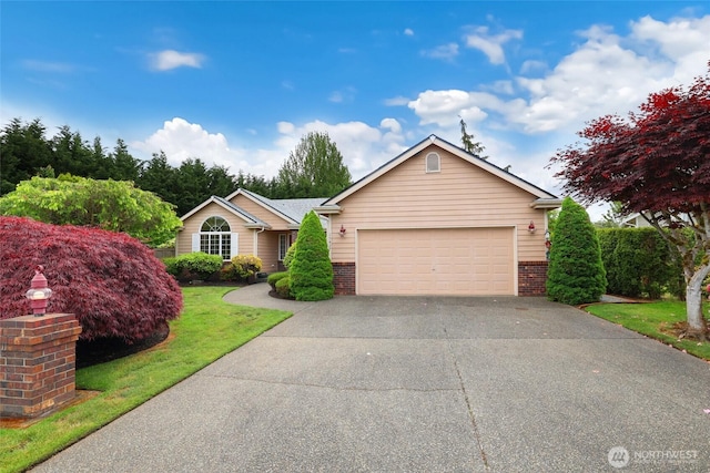 15427 148th Avenue Ct E, Orting, WA 98360 - single story home featuring brick siding, driveway, an attached garage, and a front lawn