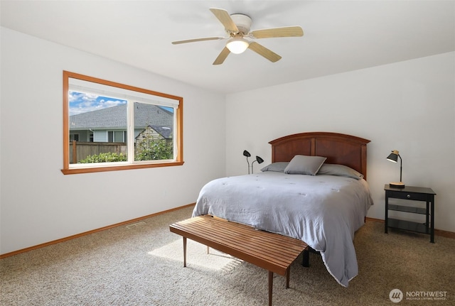 15427 148th Avenue Ct E, Orting, WA 98360 - carpeted bedroom featuring baseboards and a ceiling fan