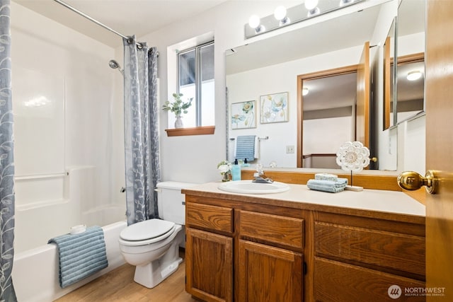 2169 S 278th St, Federal Way, WA 98003 - full bath with toilet, shower / bathtub combination with curtain, vanity, and wood finished floors