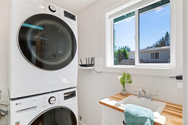 3755 Cyprus Way, Ferndale, WA 98248 - laundry area featuring stacked washing machine and dryer